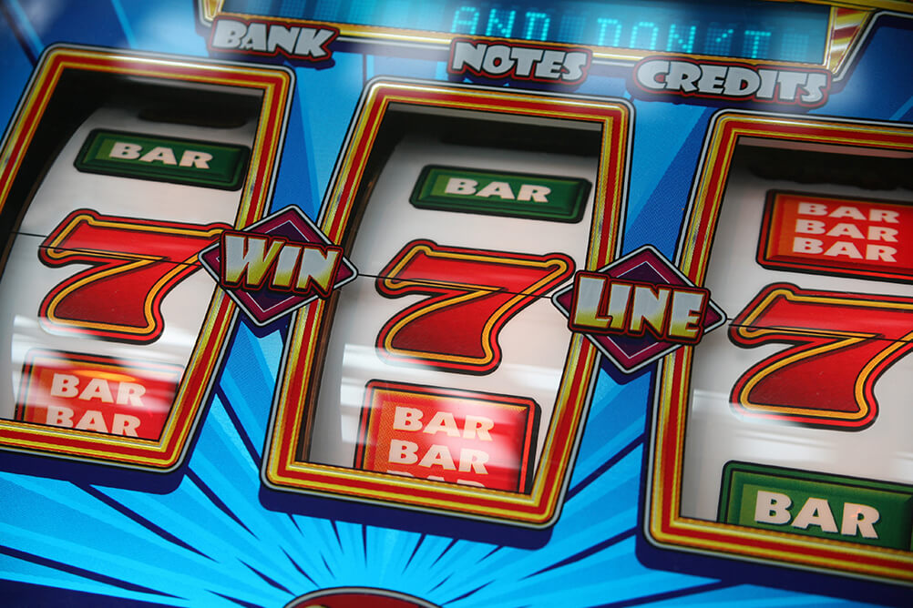 An image from a slot machine showing several BAR symbols